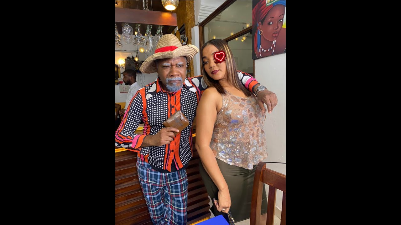 Tonton Bicha renmen ak yon bèl Dominikèn. Jeff Konplis.