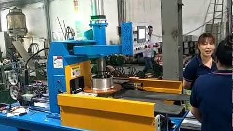 Full automatic wrapping coiling and packing machine