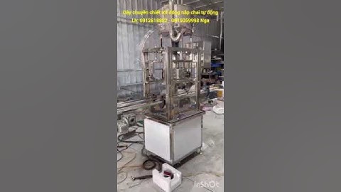 Dây chuyền chiết rót đóng nắp chai tự động