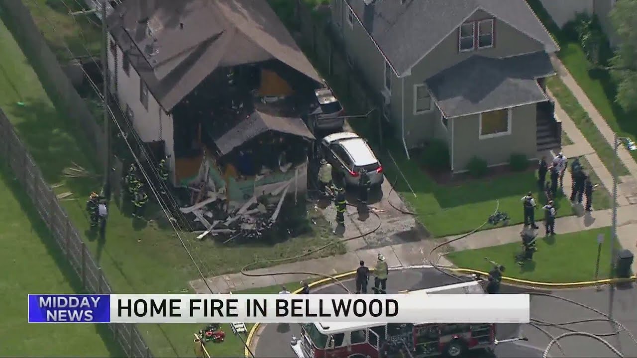 Firefighters battle house fire in Bellwood - YouTube