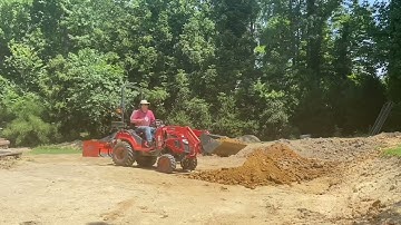 Time Lapse of Kioti CS2520 with CL2420 front end loader, moving, spreading, compacting.