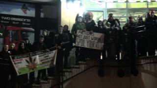 Anonymous protesters on the streets of Cardiff