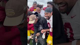 USC Football Team Gets Surprise Visit by Travis Scott