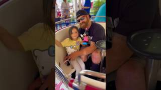 Paralyzed Daddy riding rides with his little girl ?.