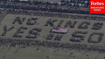 Aerial Shot Captures Massive Human Sign In San Francisco, California, Reading 