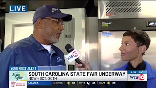 Billie Jean Shaw talks to Mr. Seafood's owner at the SC State Fair