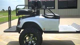 Custom EZGO ST Sport with 4 passenger custom Golf Cart Trailer by MikesMotorToys