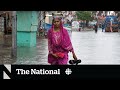 Pakistan floods wash away villages and crops, leave more than 1,000 dead