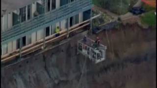 Another chunk of a disintegrating cliff in pacifica, calif. fell into
the ocean threatening two apartment buildings above. crews have begun
drilling 50 foot ...