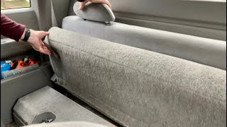 How to fold down the back seat on a Chevrolet truck