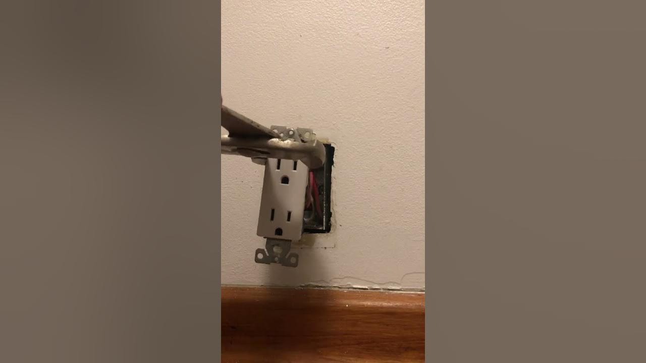 Disconnecting live electrical outlet that is sparking inside YouTube
