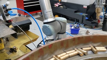 Testing UR robot processing lock cylinder