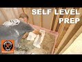 How to Self Level Bathroom Floors Part 1...Prep Concrete Basement Floor -- by Home Repair Tutor