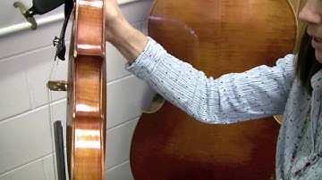 Mrs  Brown demonstrates how to attach a shoulder rest