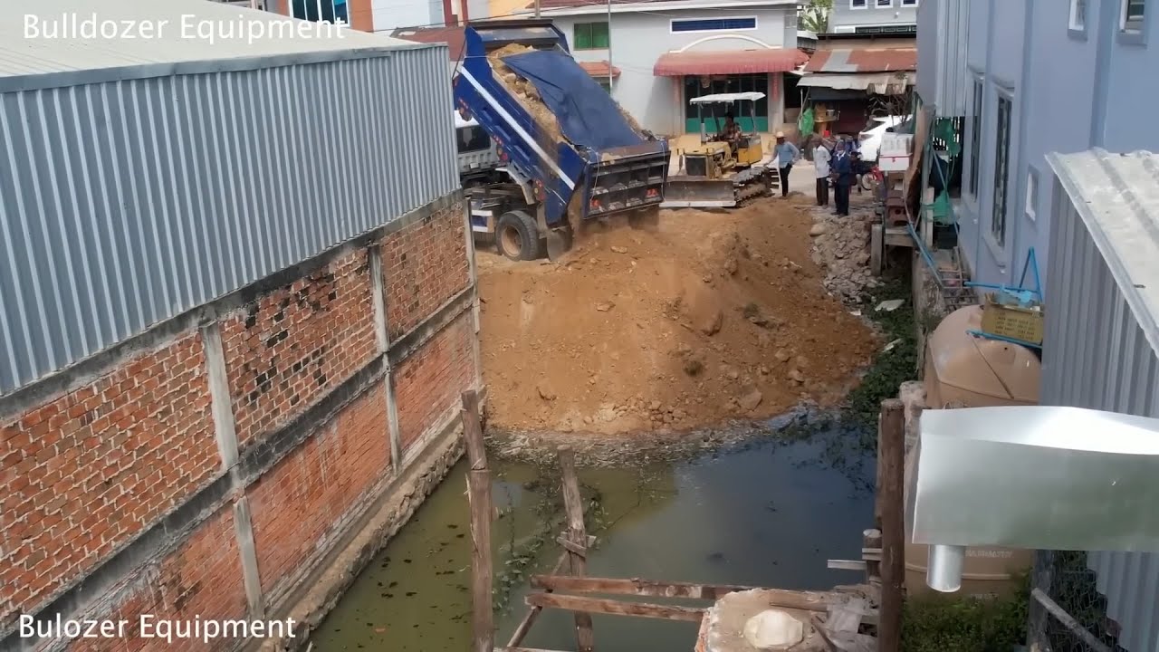 Crocodile pond project with 100% water, size 6 meters By 12 meters By Dump mTruck 5T & BULLDOZER