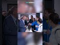 A voter taken by surprise after noticing Türkiye’s President Erdogan right behind him