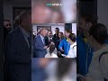 A voter taken by surprise after noticing Türkiye’s President Erdogan right behind him
