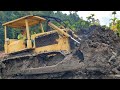 Excellent work of caterpillar d6d bulldozer operators working to level clay