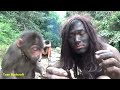 Primitive life living solo bushcraft cooking fish in the forest meet forest people