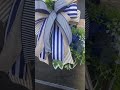Nautical welcome wreath with navy florals! #nauticaldecor #seasidedecor #coastaltheme #summerdecor