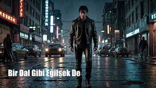 Bir Dal Gibi Eğilsek De