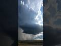 Twisting storm dominates the landscape.