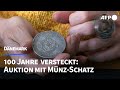 Hundert Jahre versteckt: Seltene Münzsammlung wird versteigert | AFP