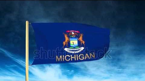 michigan flag slider style with title. Waving in the wind with cloud background animation Stock