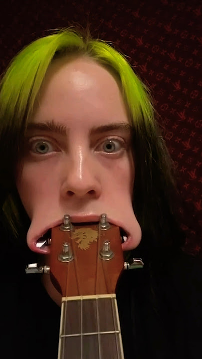 Billie Eilish fits entire ukulele head in her mouth … TWICE 😂 #shorts #billieeilish