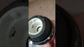 How to release a stuck valve pin in a radiator thermostat