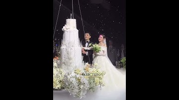 Midu cùng chồng cắt chiếc bánh kem cao 2m