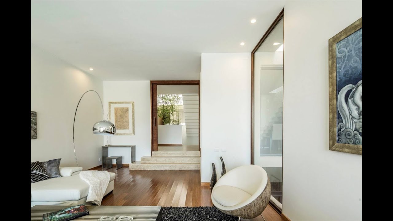 View of Design Detail in a Custom Renovation: A Louvered Staircase That Helps ...