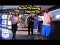 Rock-Throwing Dispute: Hotel Incident Ends in Arrest