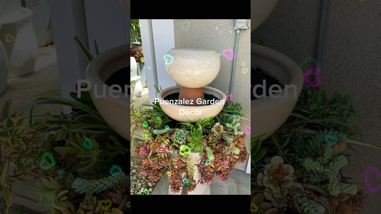 Birdbath into a planter with water fountain. 