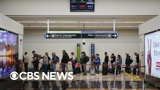 Airport delays escalate as lawmakers feud over DHS funding