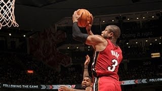 Cole's 3/4 court alley-oop to Dwyane Wade!