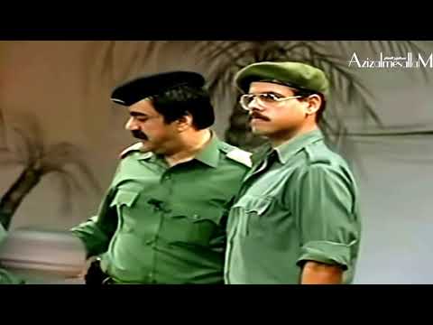 صدام حسين ينطي نوط شجاعه