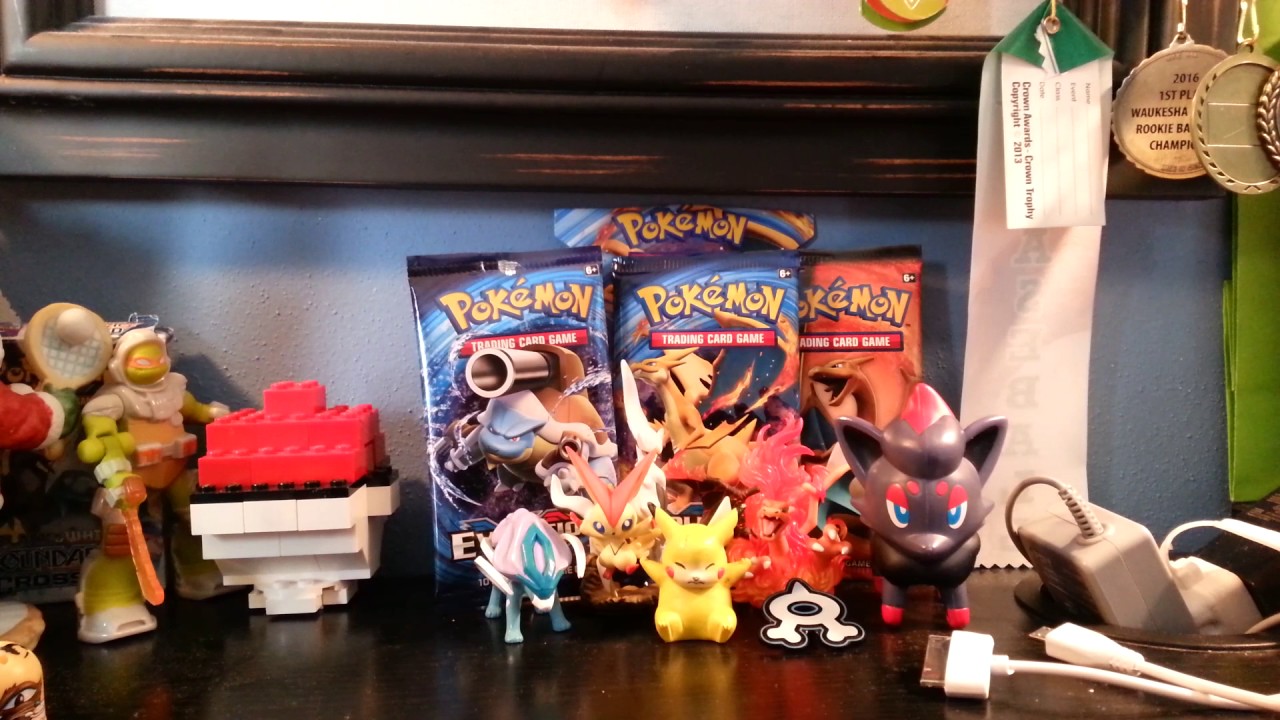 opening a Pokemon steam Siege booster pack and getting decent pulls