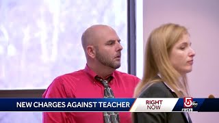 Former teacher accused of filming students in bathroom faces new charges