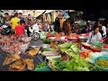 Chbar Ampov Evening Street Market Scene - Daily Lifestyle of Vendors Selling Some Food in Evening