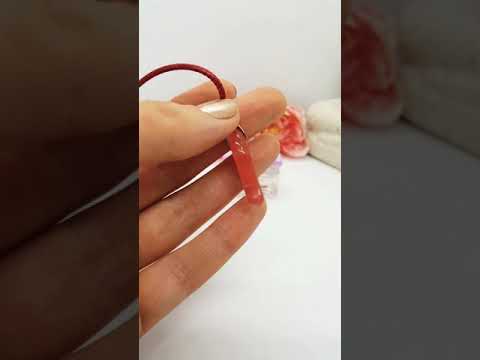 Ніжний кулон "крило ангела" натуральнийрізний камінь халцедон на шнурку, видео 1