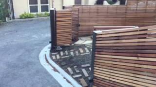 Automated driveway gates with underground operators IronGrain.com.