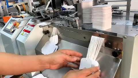 Automatic tag card threading knotting machine