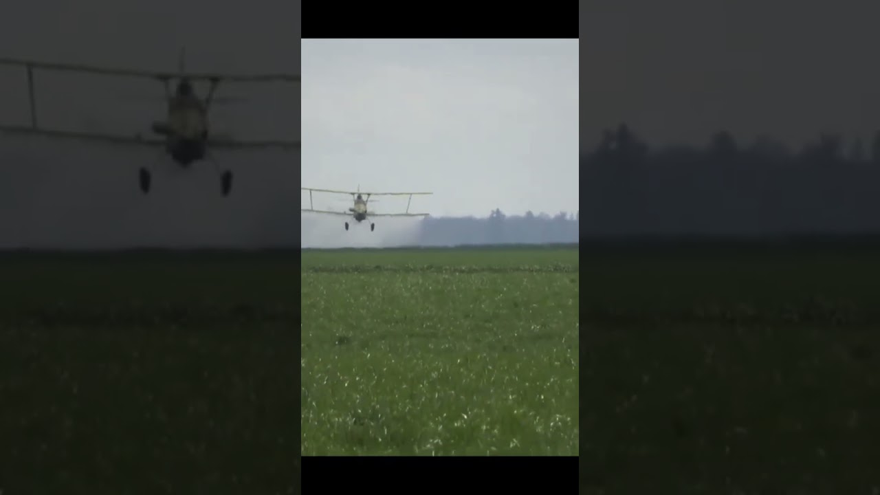 Airplane Spraying Crops. 