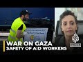 ‘Target on their back’: Aid workers halt efforts after deadly Israeli strikes