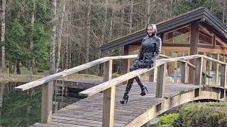 4k,Granate ravelling walking outdoor, enjoying late sunrays in her garden, #crotch high boots.