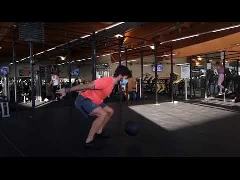 Slam ball throw drop squat (drop to base position)