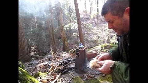 Flint and steel fire using a lamp wick.