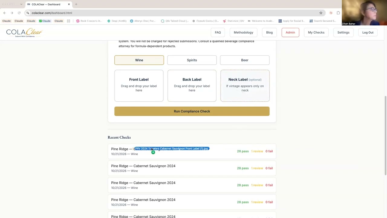 COLAClear demo: a wine label checked against TTB rules, returning a compliance report with pass, review, and fail results and CFR citations.