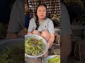 Two sisters squatting down, peeling vegetable leaves—the scene is so real!
